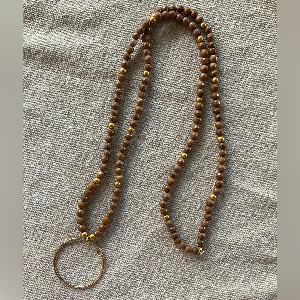 Brown beaded necklace with Gold ring